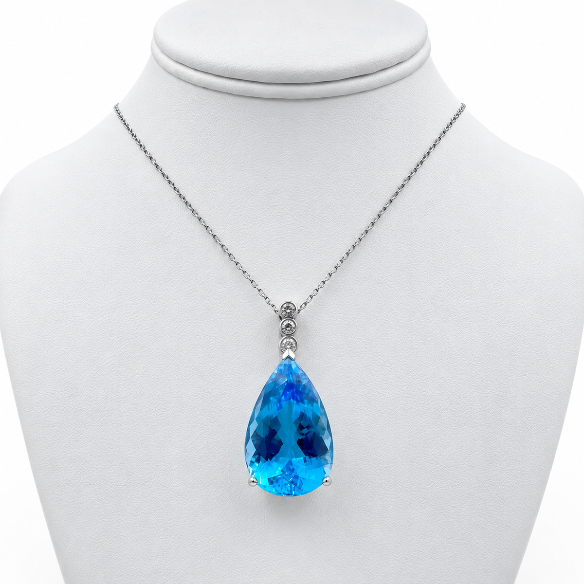 14k White Gold Pendant with 57 Ct. Blue Topaz and 18" Necklace.