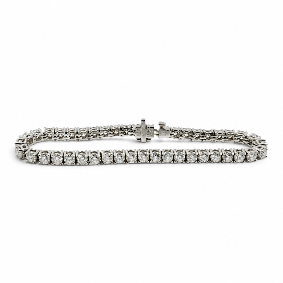 Ladies 9.00 Carat Platinum Tennis Bracelet with VS1 / E-F 44 Brilliant Round Diamonds - Total Weight 27.4 Grams. (Size 7.0")