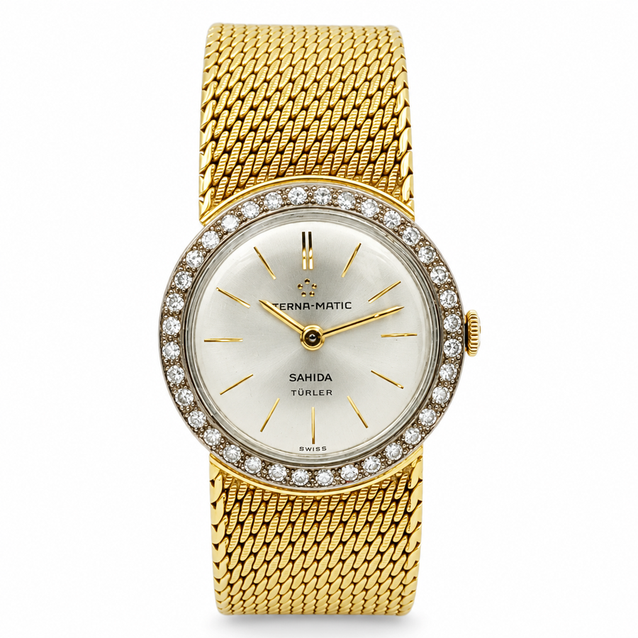 Ladies Eterna-Matic Sahida Turler 24mm Vintage 18K Yellow Gold Watch with Silver Dial and Diamond Bezel. (Pre-Owned)