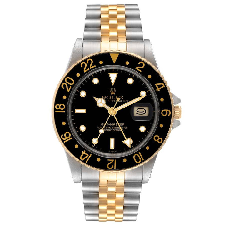 1978 Men's Rolex 40mm Vintage GMT Master 18K Gold / Stainless Steel Two Tone Watch with Black Bezel and Black Dial. (Pre-Owned 1675)