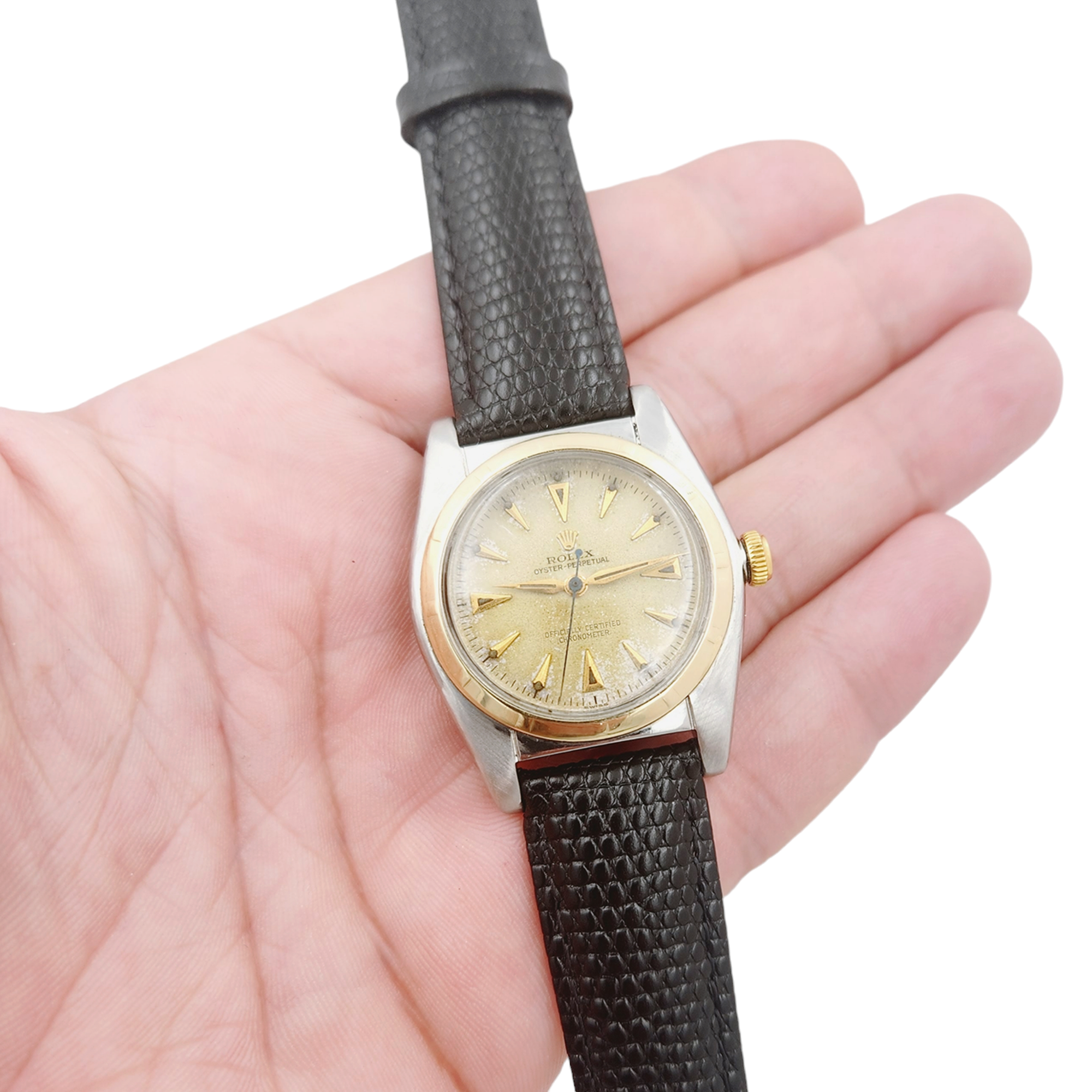 1957 Men's Rolex 32mm Bubbleback Vintage Oyster Perpetual Two Tone Watch with Black Leather Strap and Gold Dial. (Pre-Owned 5011)