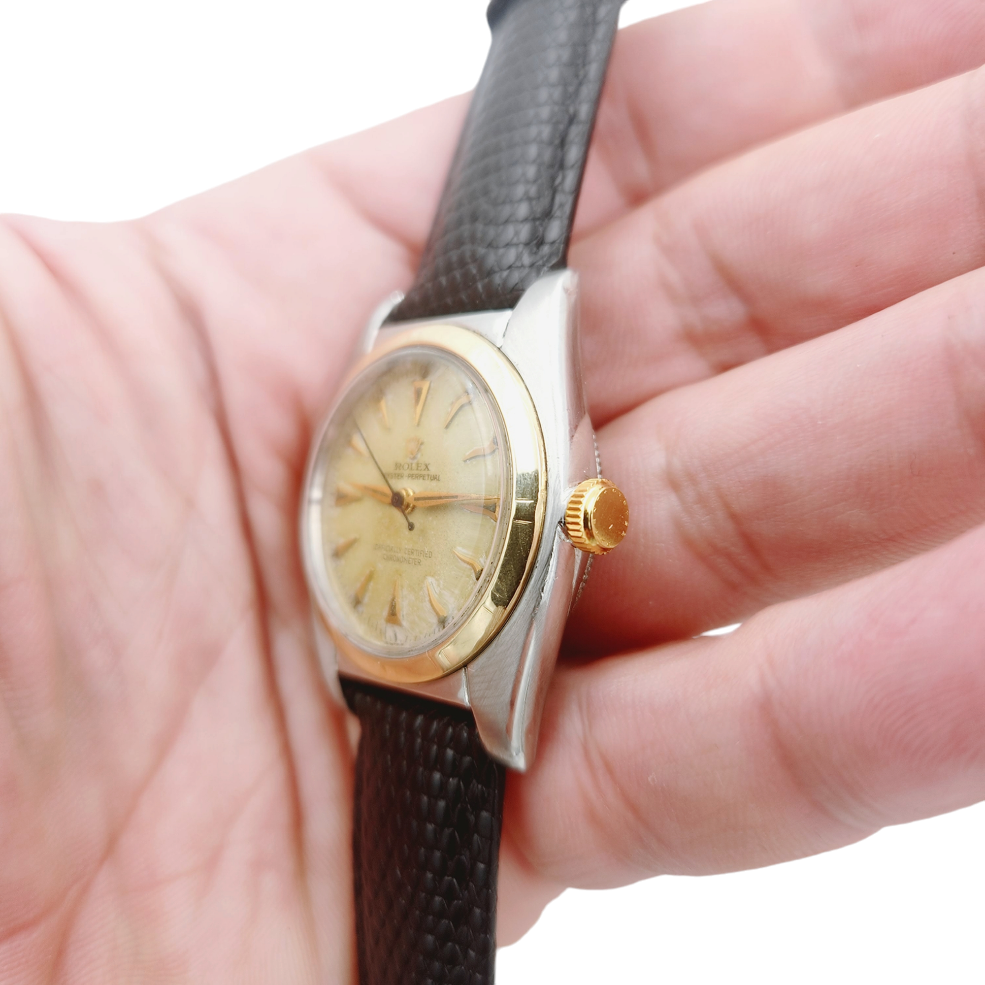 1957 Men's Rolex 32mm Bubbleback Vintage Oyster Perpetual Two Tone Watch with Black Leather Strap and Gold Dial. (Pre-Owned 5011)