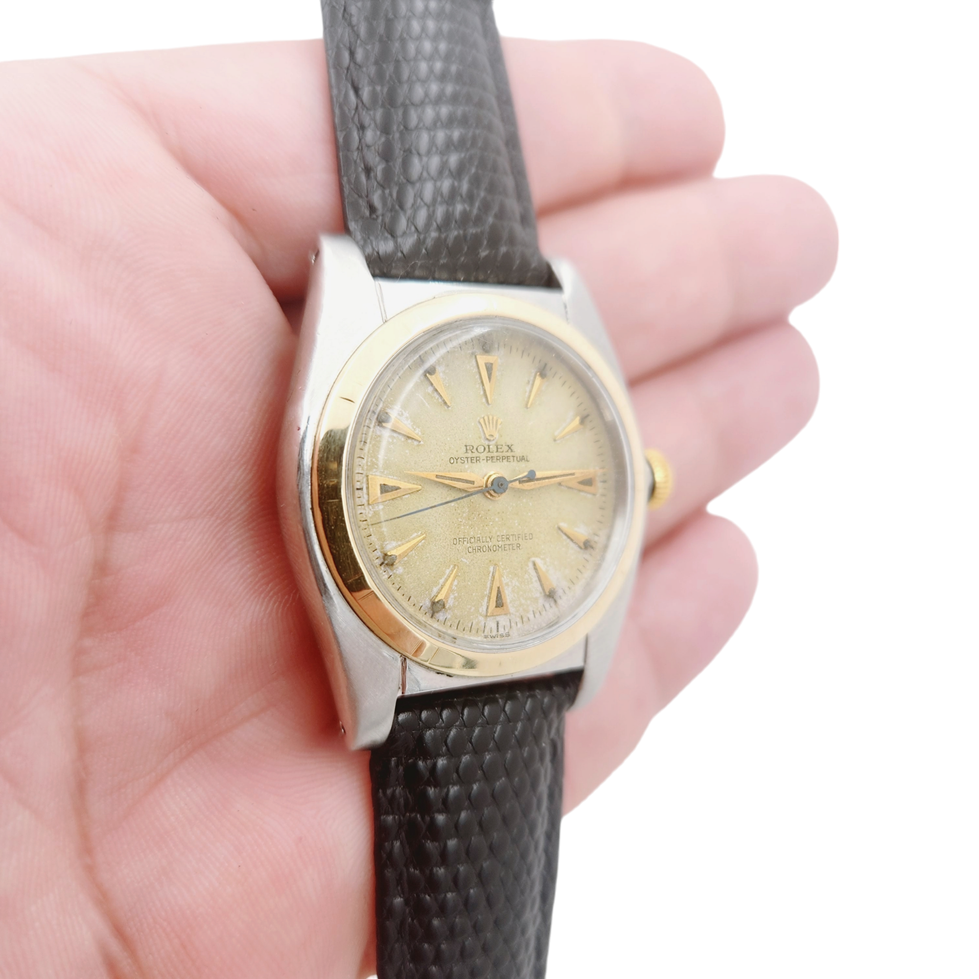 1957 Men's Rolex 32mm Bubbleback Vintage Oyster Perpetual Two Tone Watch with Black Leather Strap and Gold Dial. (Pre-Owned 5011)