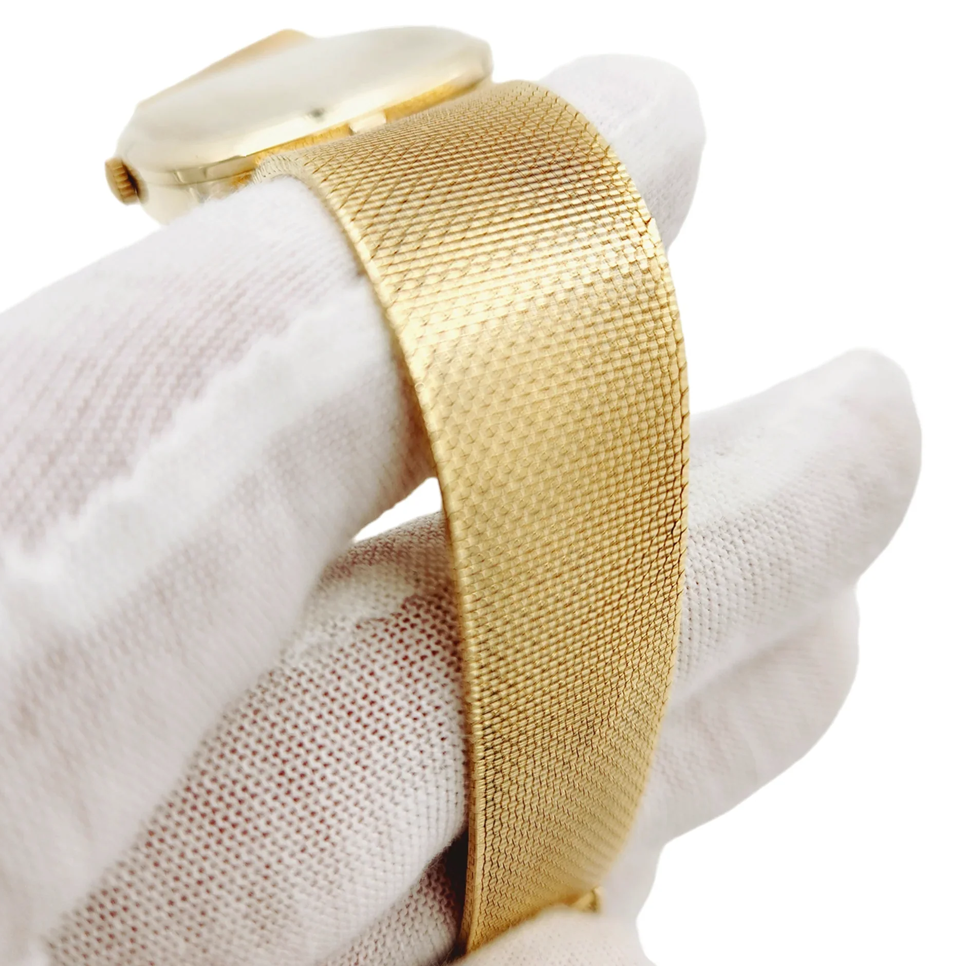 1970's Unisex Omega 29mm Vintage 14K Yellow Gold Watch with Champagne Texture Dial. (Pre-Owned)