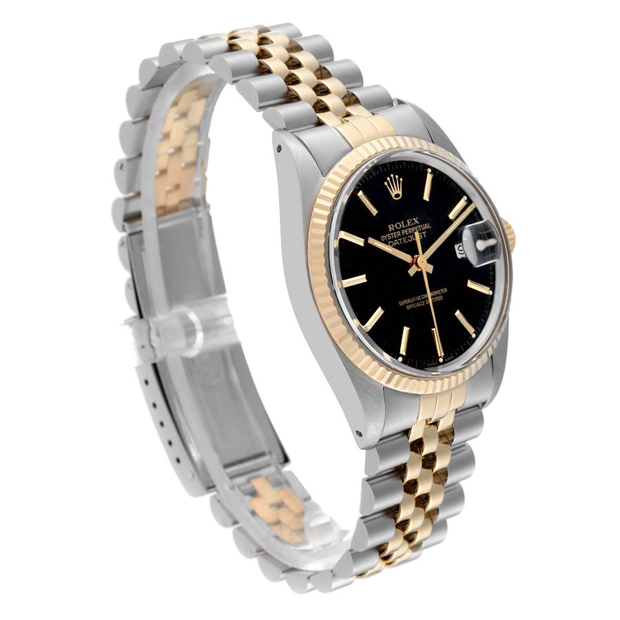 1986 Men's Rolex 36mm Vintage DateJust Two Tone 18K Yellow Gold / Stainless Steel Watch with Black Dial and Fluted Bezel. (Pre-Owned 16013)