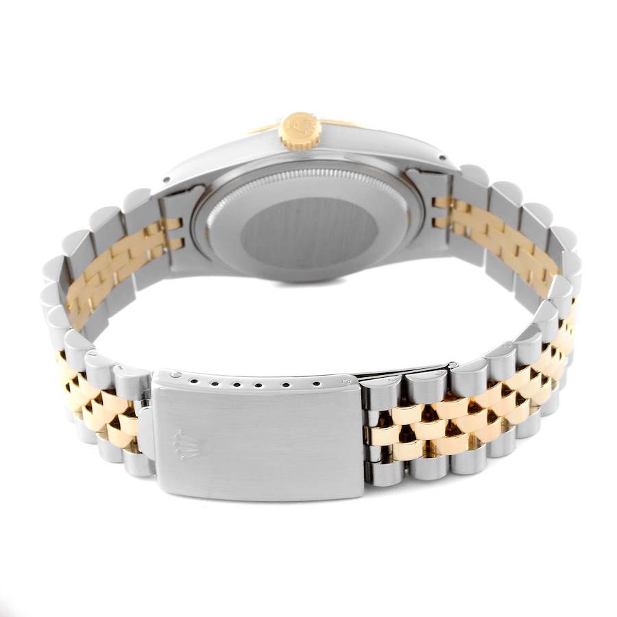 1986 Men's Rolex 36mm Vintage DateJust Two Tone 18K Yellow Gold / Stainless Steel Watch with Black Dial and Fluted Bezel. (Pre-Owned 16013)