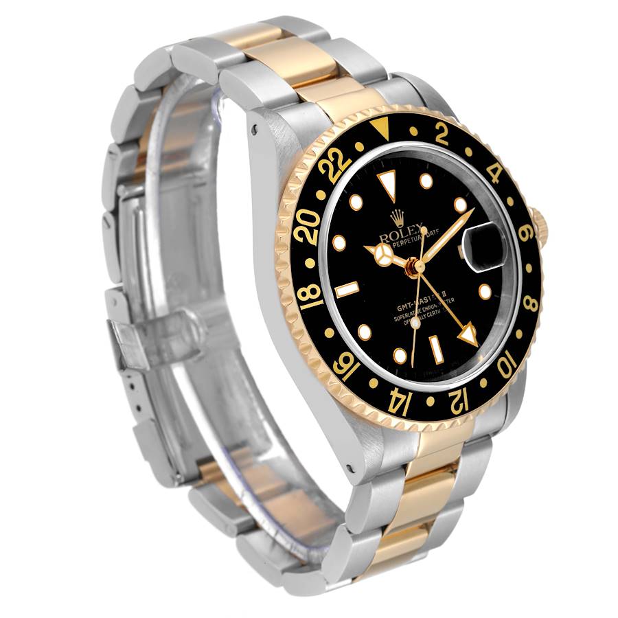 *1995 Men's Rolex 40mm GMT Master II Two Tone 18K Yellow Gold / Stainless Steel Watch with Black Bezel and Black Dial. (Pre-Owned 16713)