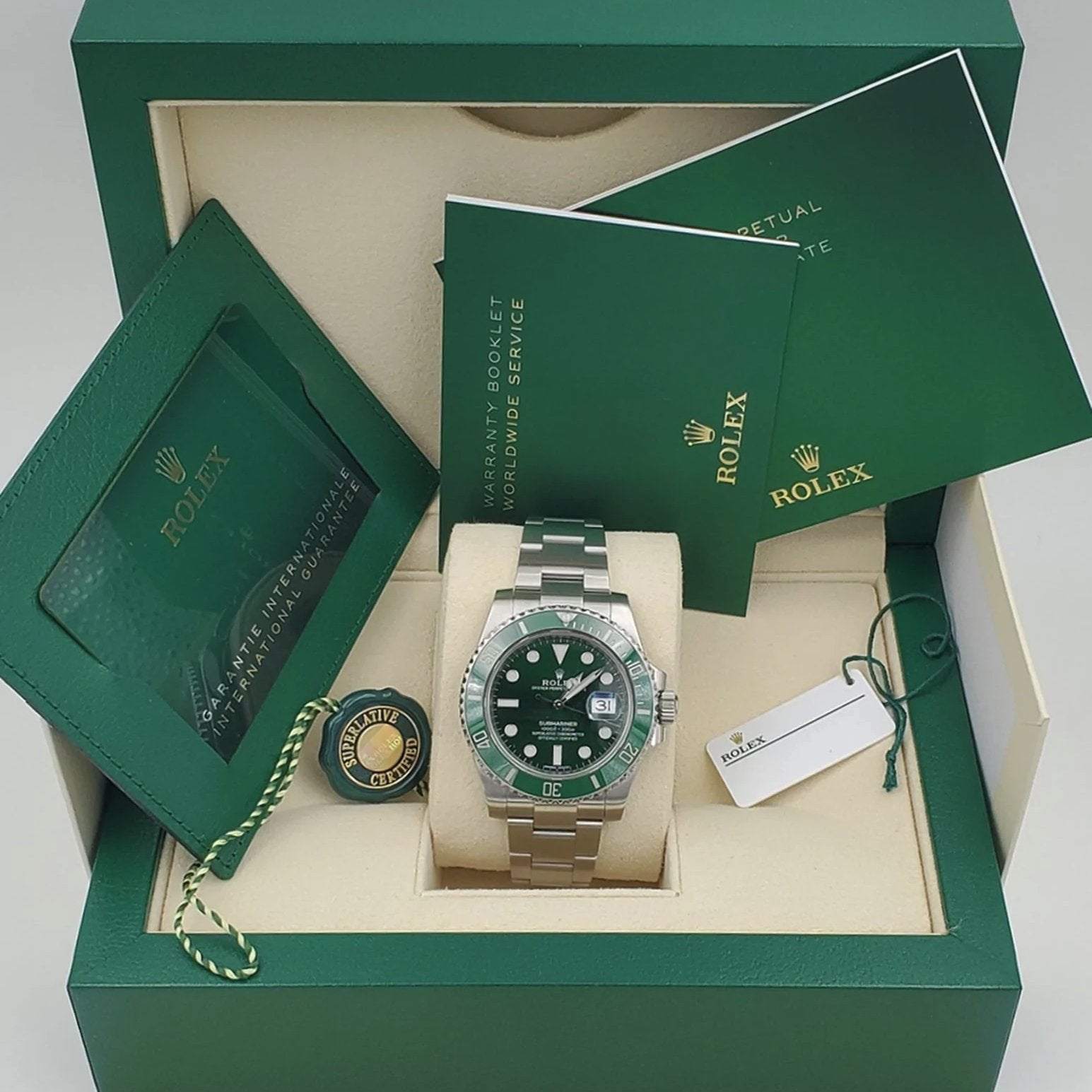 2015 Men's Rolex 40mm Submariner "Hulk" Oyster Perpetual Date Stainless Steel Watch with Green Dial and Green Bezel. (Pre-Owned 116610LV)