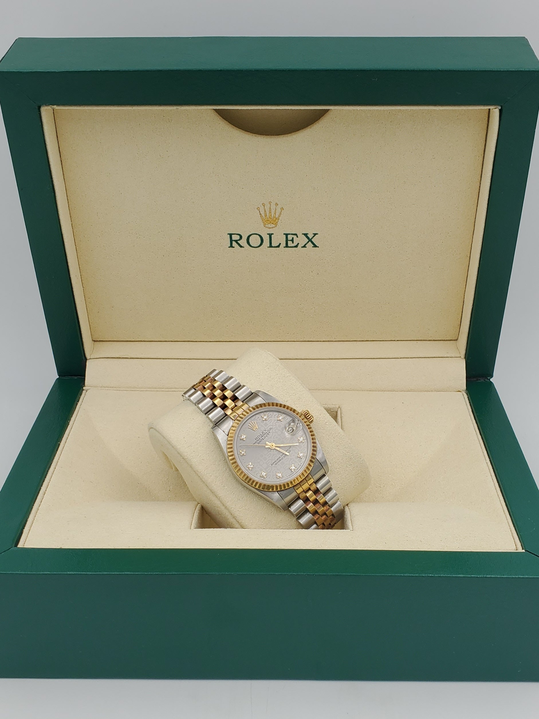 Ladies Rolex Midsize 31mm DateJust Two Tone 18K Yellow Gold / Stainless Steel Wristwatch w/ Silver Diamond Dial & Fluted Bezel. (Pre-Owned 682735)