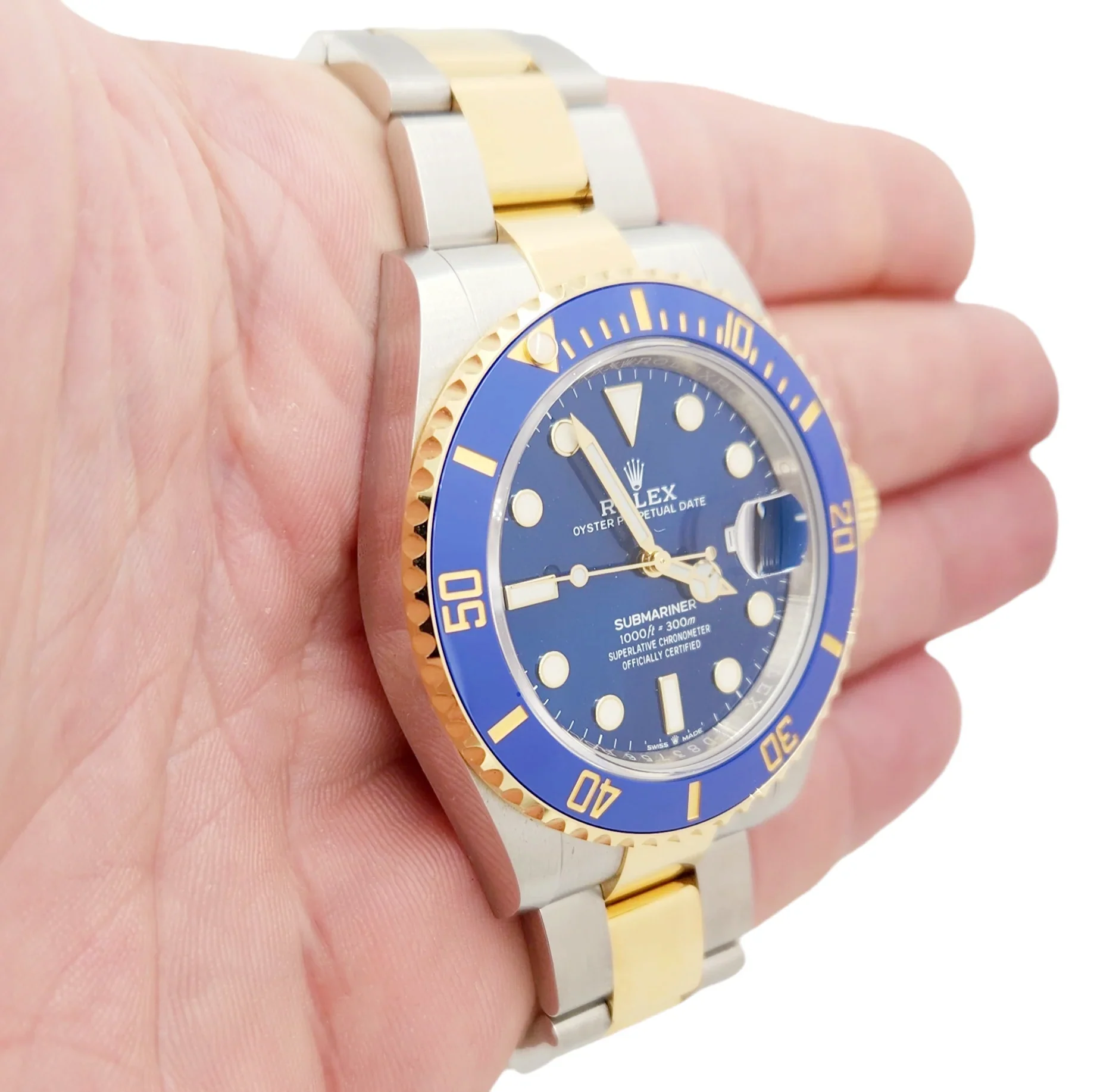 2023 Men's Rolex 40mm Submariner Oyster Perpetual Two Tone 18K Yellow Gold / Stainless Steel Watch with Blue Dial and Blue Bezel. (Unworn 126613LB)