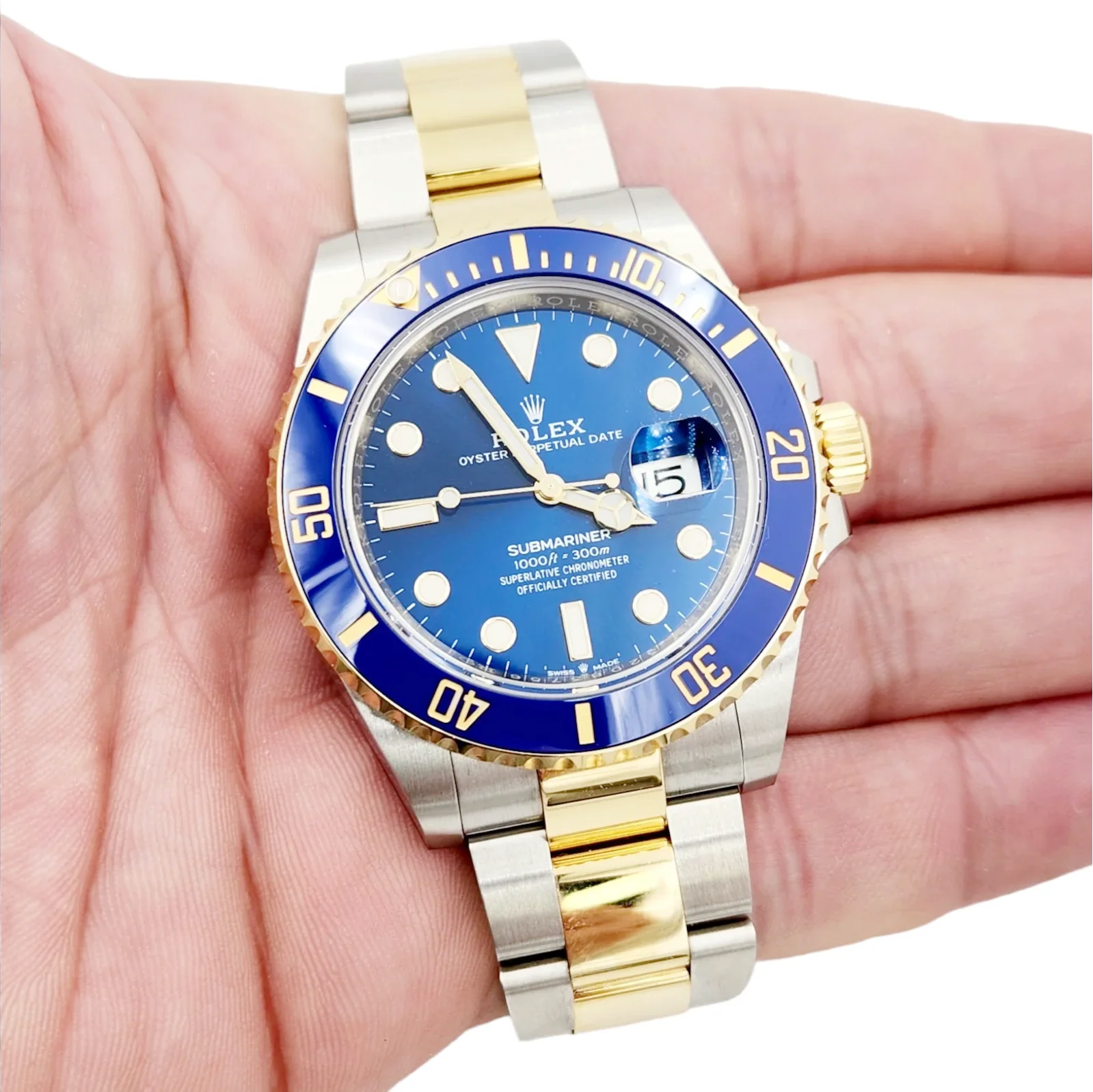 2023 Men's Rolex 40mm Submariner Oyster Perpetual Two Tone 18K Yellow Gold / Stainless Steel Watch with Blue Dial and Blue Bezel. (Unworn 126613LB)