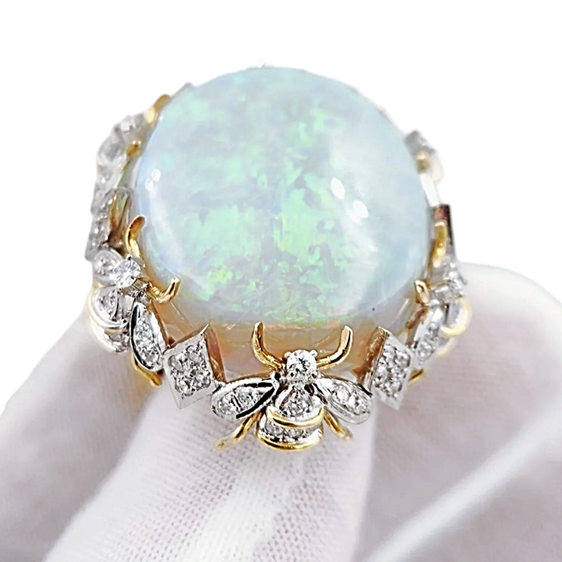 Estimated 30 to 35 Carat Australian Multi Color Fiery Antique Art Deco Fancy Rainbow Crystal Opal Ring with 1.00CT SI2-G Diamonds in 14K Yellow Gold.