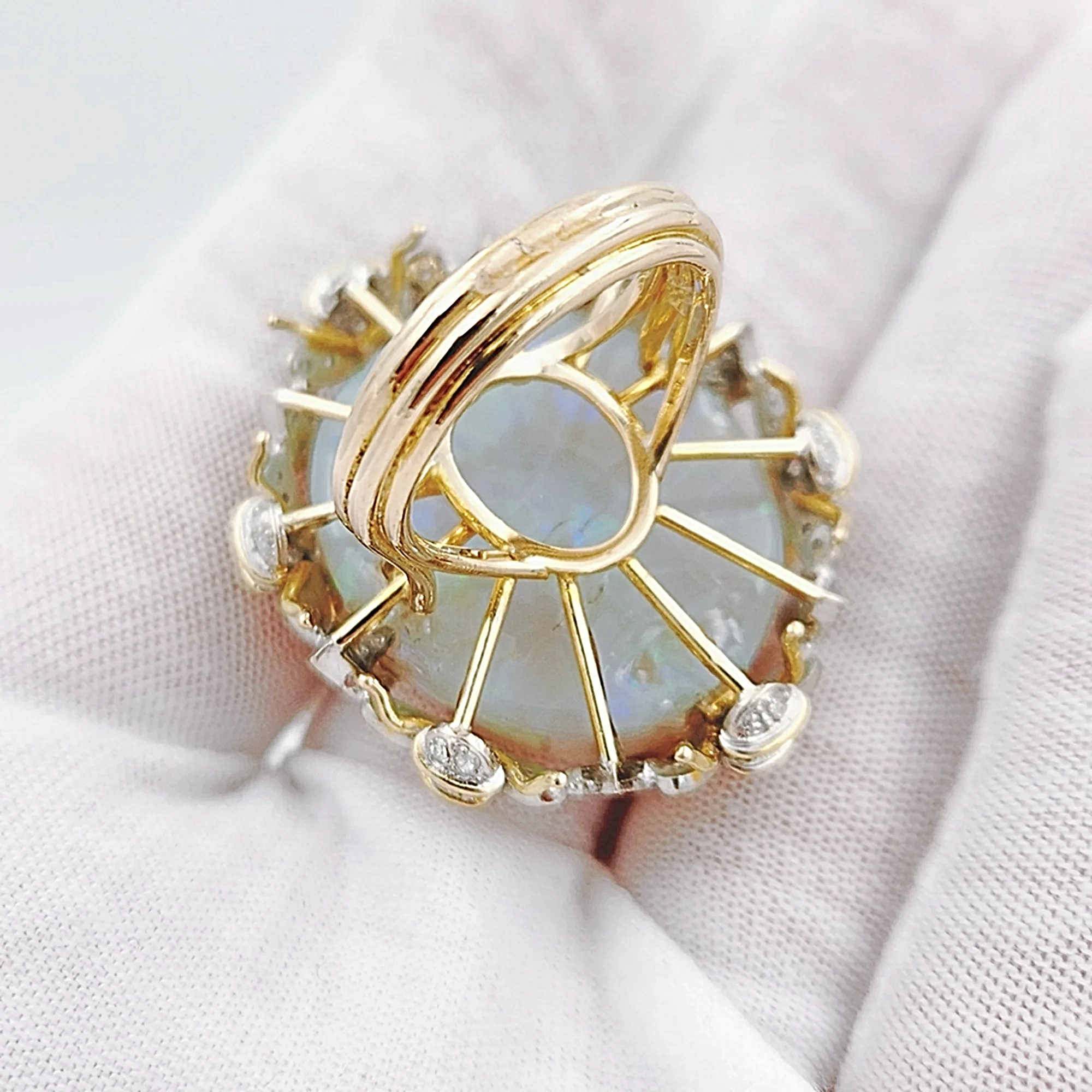 Estimated 30 to 35 Carat Australian Multi Color Fiery Antique Art Deco Fancy Rainbow Crystal Opal Ring with 1.00CT SI2-G Diamonds in 14K Yellow Gold.