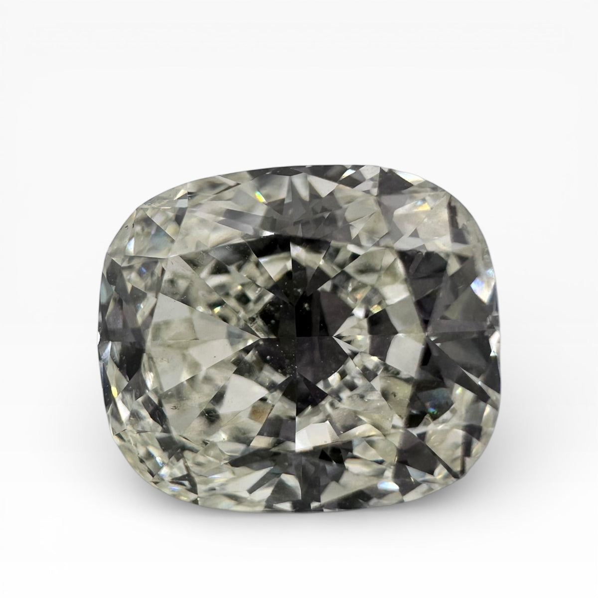 3.20 Carat GIA Certified SI2, Color K, Cushion Cut Natural Diamond.