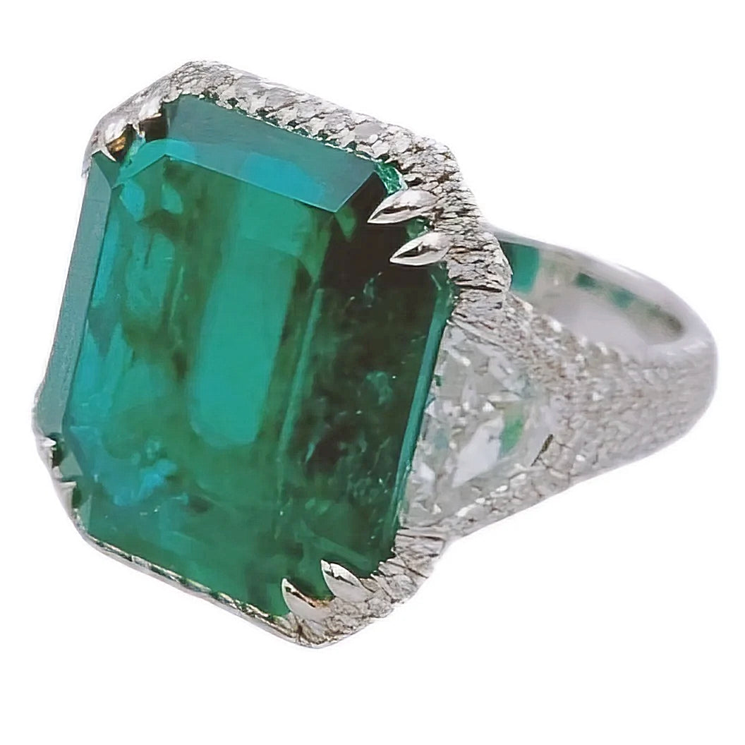 16.81 Carat GIA Certified Colombian Emerald 18K White Gold Ring with VS / F Side Stone.