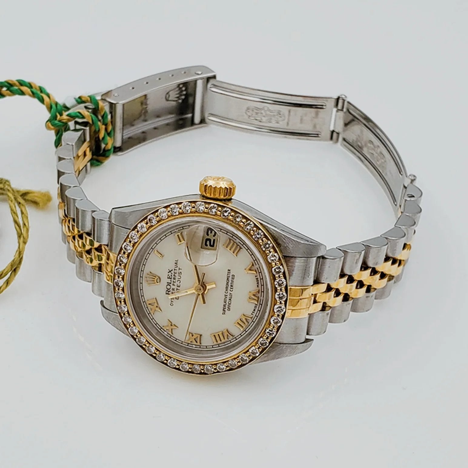 Ladies Rolex 18K Gold Two Tone 26mm DateJust Wristwatch w/ Off-White Dial, Roman Numerals & Diamond Bezel. (Pre-Owned)