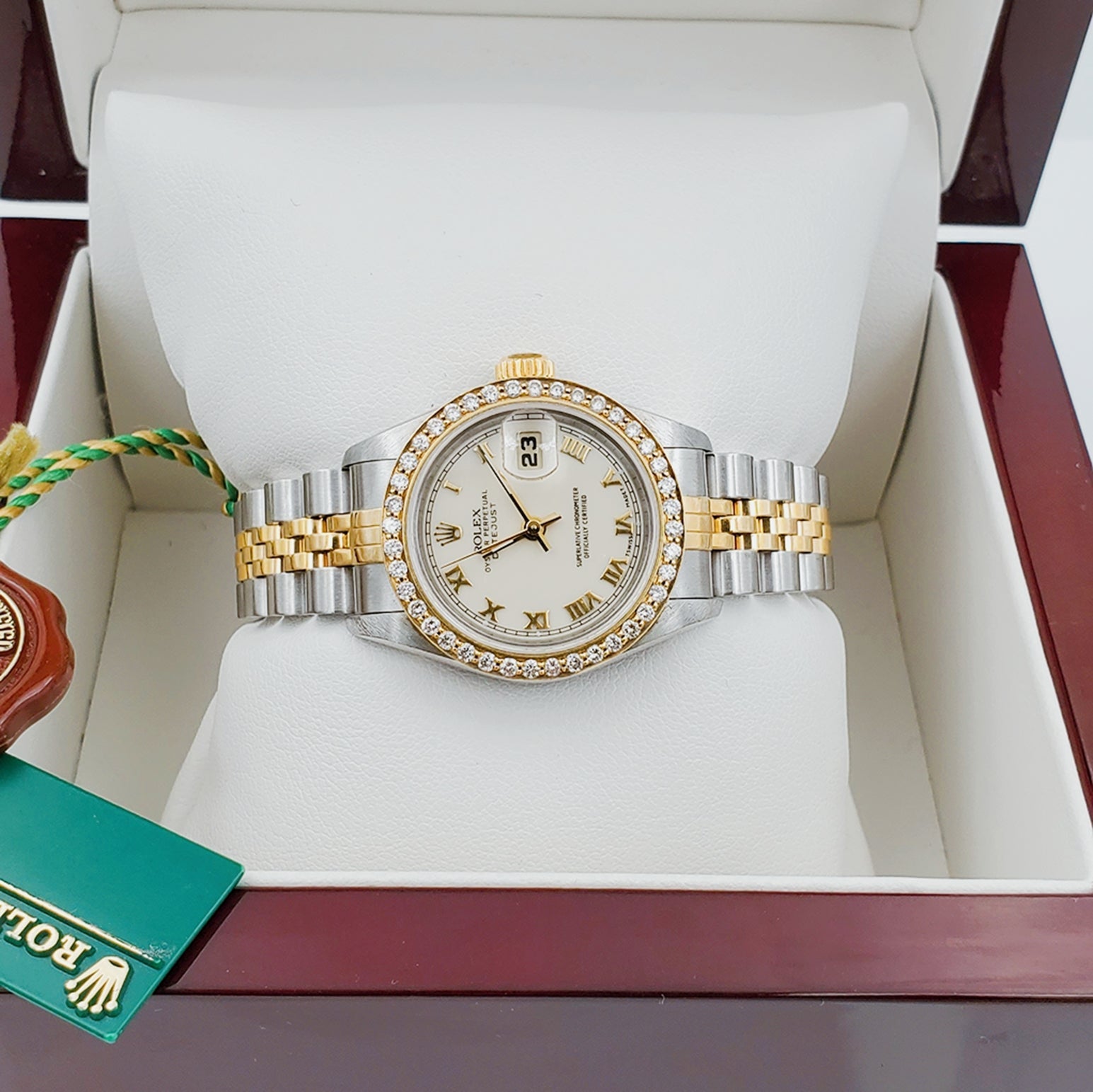 Ladies Rolex 18K Gold Two Tone 26mm DateJust Wristwatch w/ Off-White Dial, Roman Numerals & Diamond Bezel. (Pre-Owned)