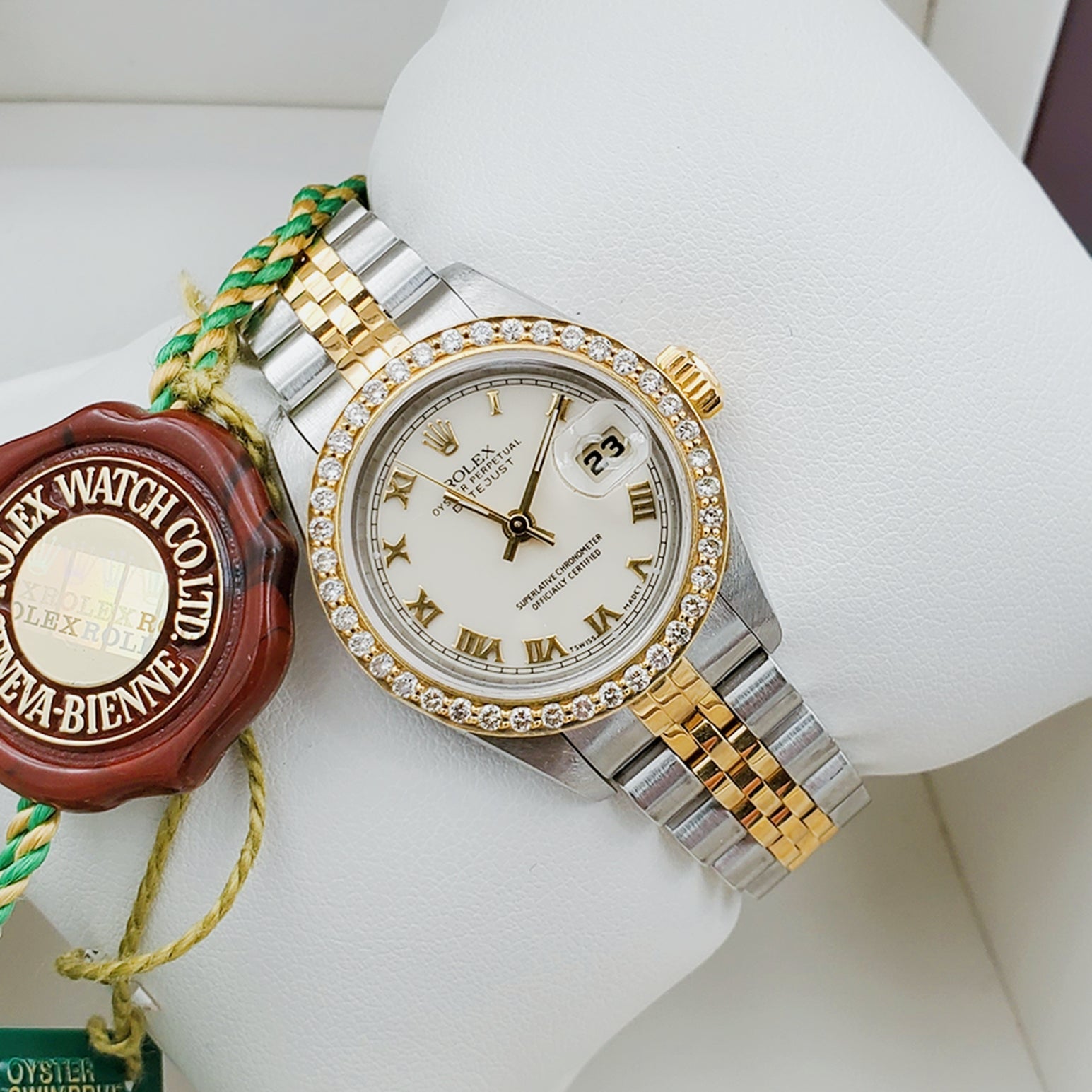 Ladies Rolex 18K Gold Two Tone 26mm DateJust Wristwatch w/ Off-White Dial, Roman Numerals & Diamond Bezel. (Pre-Owned)