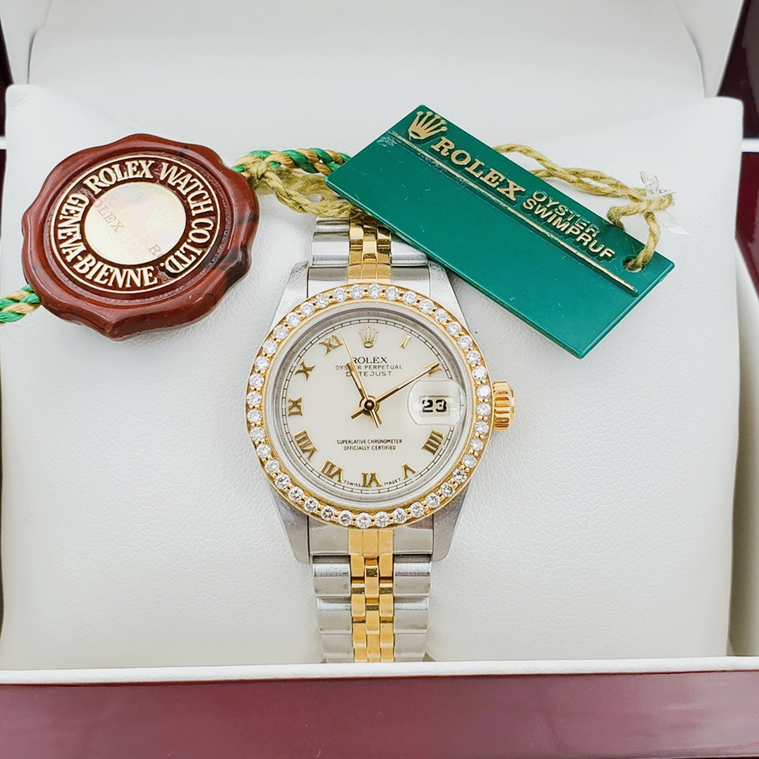 Ladies Rolex 18K Gold Two Tone 26mm DateJust Wristwatch w/ Off-White Dial, Roman Numerals & Diamond Bezel. (Pre-Owned)