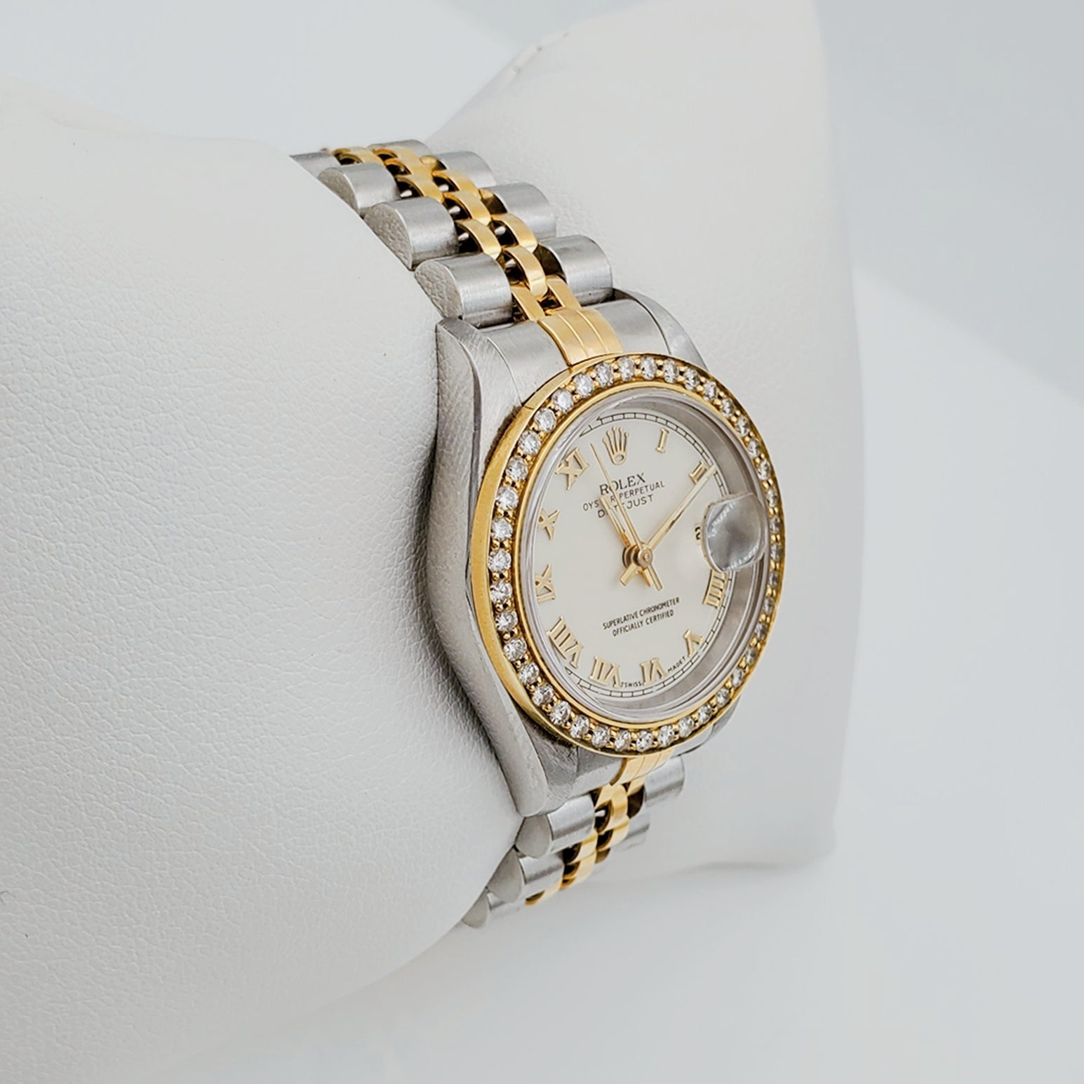 Ladies Rolex 18K Gold Two Tone 26mm DateJust Wristwatch w/ Off-White Dial, Roman Numerals & Diamond Bezel. (Pre-Owned)