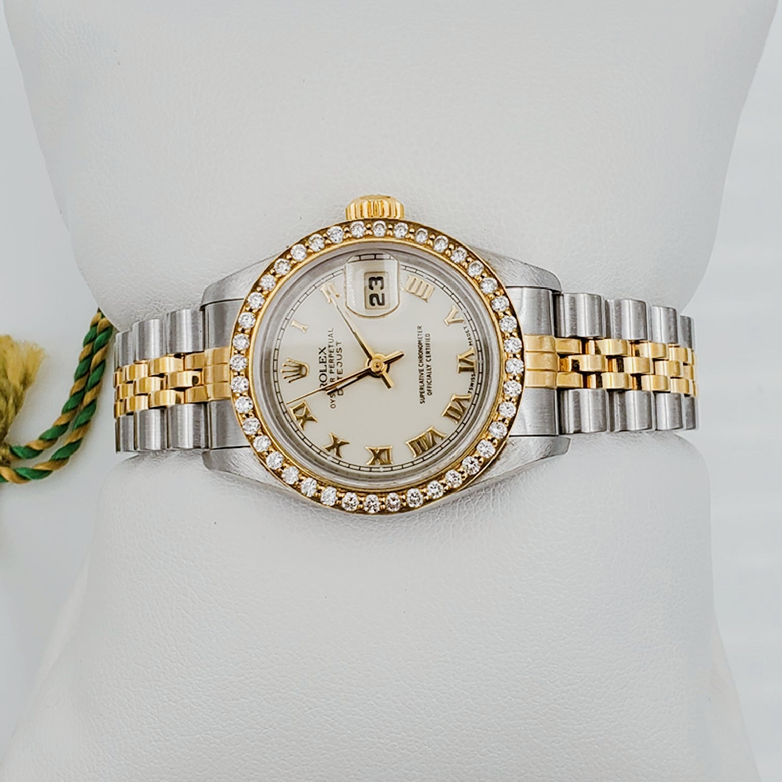 Ladies Rolex 18K Gold Two Tone 26mm DateJust Wristwatch w/ Off-White Dial, Roman Numerals & Diamond Bezel. (Pre-Owned)