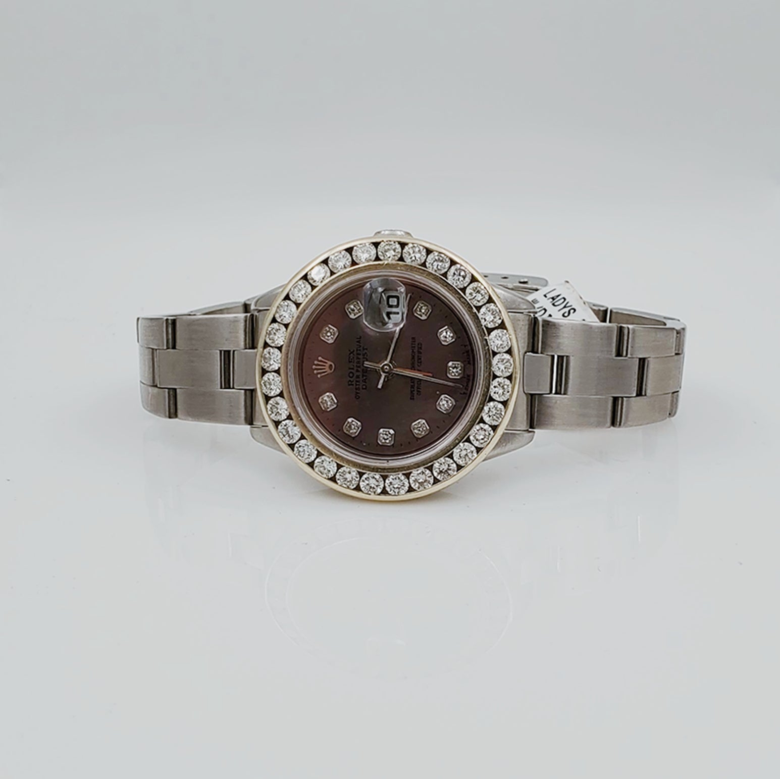 Ladies Rolex 26mm DateJust Stainless Steel Wristwatch w/ Mother of Pearl Black Diamond Dial & Custom Diamond Bezel. (Pre-Owned)