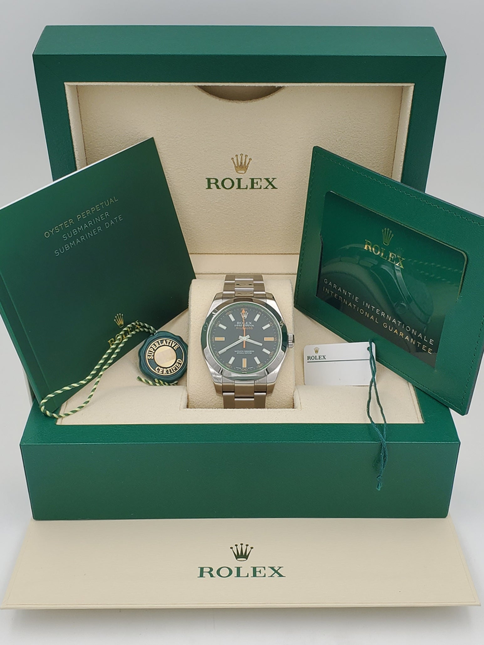 Men's Rolex 40mm Milgauss Oyster Perpetual Stainless Steel Watch with Green Dial and Smooth Bezel. (Pre-Owned 116400GV)