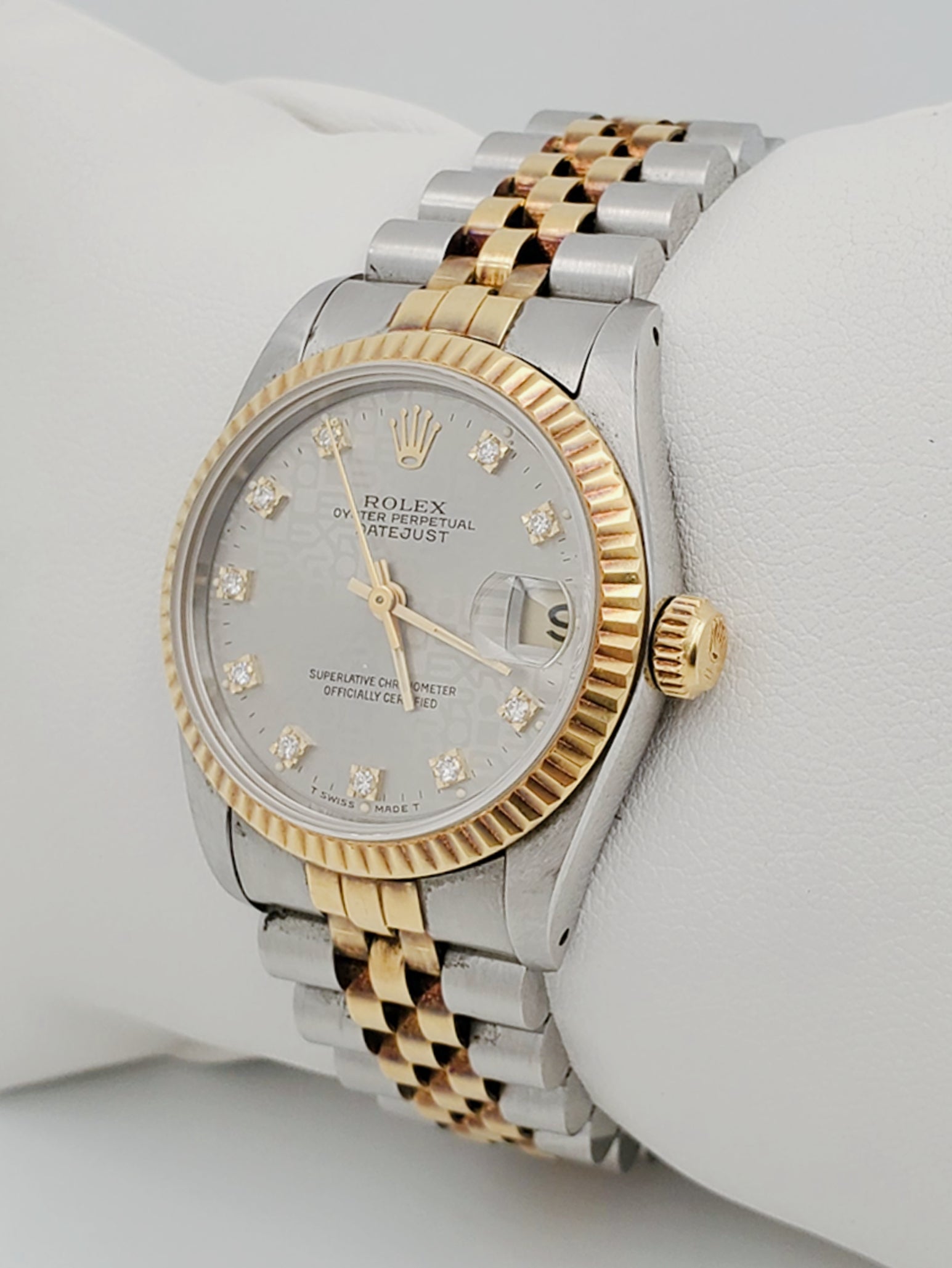 Ladies Rolex Midsize 31mm DateJust Two Tone 18K Yellow Gold / Stainless Steel Wristwatch w/ Silver Diamond Dial & Fluted Bezel. (Pre-Owned 682735)