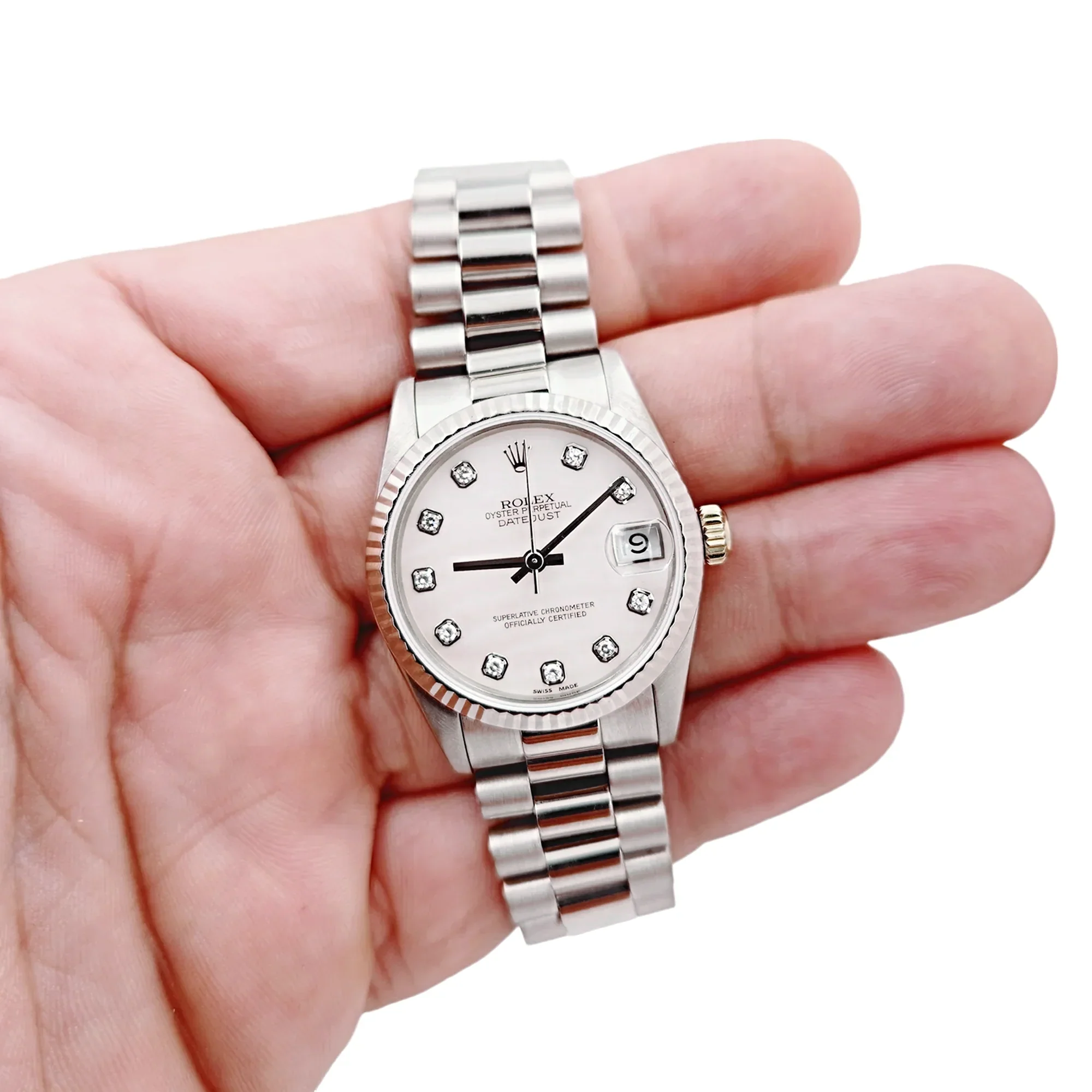 Ladies Midsize Rolex 31mm DateJust 18K White Gold Watch with Pink Diamond Dial and Fluted Bezel. (Pre-Owned 68279)