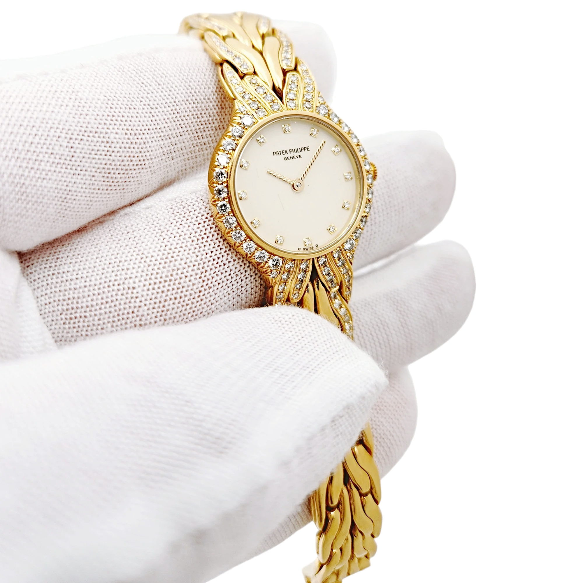 Ladies Patek Philippe 23mm La Flamme 18K Yellow Gold Watch with Cream Diamond Dial and Diamond Bezel. (Pre-Owned Model 4816/3)