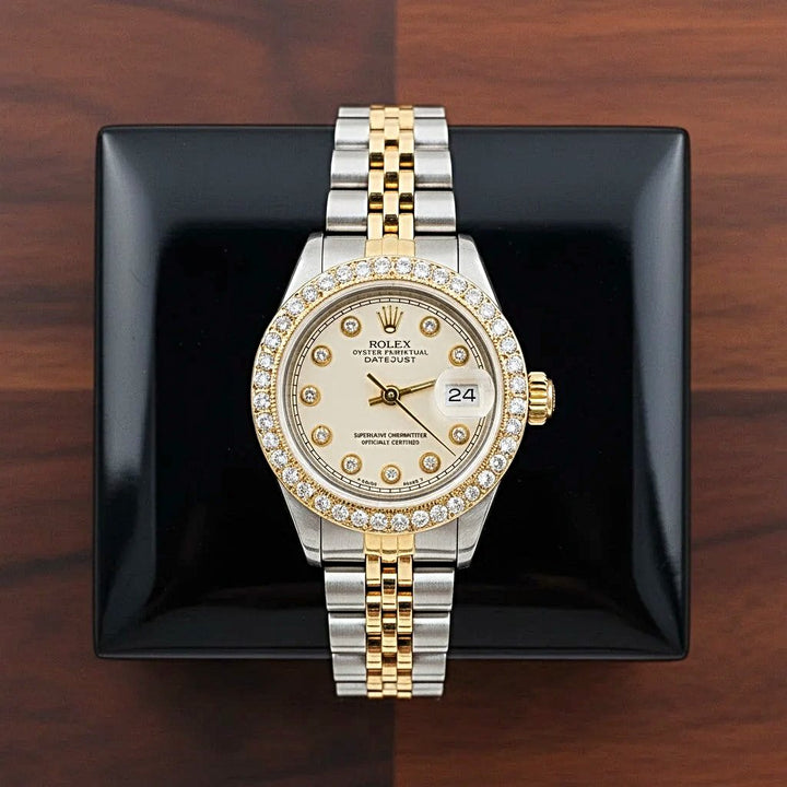 Ladies Rolex 26mm DateJust Two Tone 18K Gold / Stainless Steel Watch with Beige Diamond Dial and Diamond Bezel. (Pre-Owned 69173)