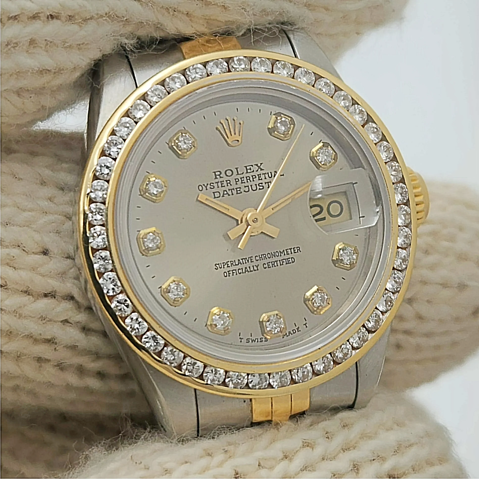 Ladies Rolex 26mm Datejust 18K Yellow Gold / Stainless Steel Two Tone Watch with Silver Diamond Dial and Diamond Bezel. (Pre-Owned 69173)