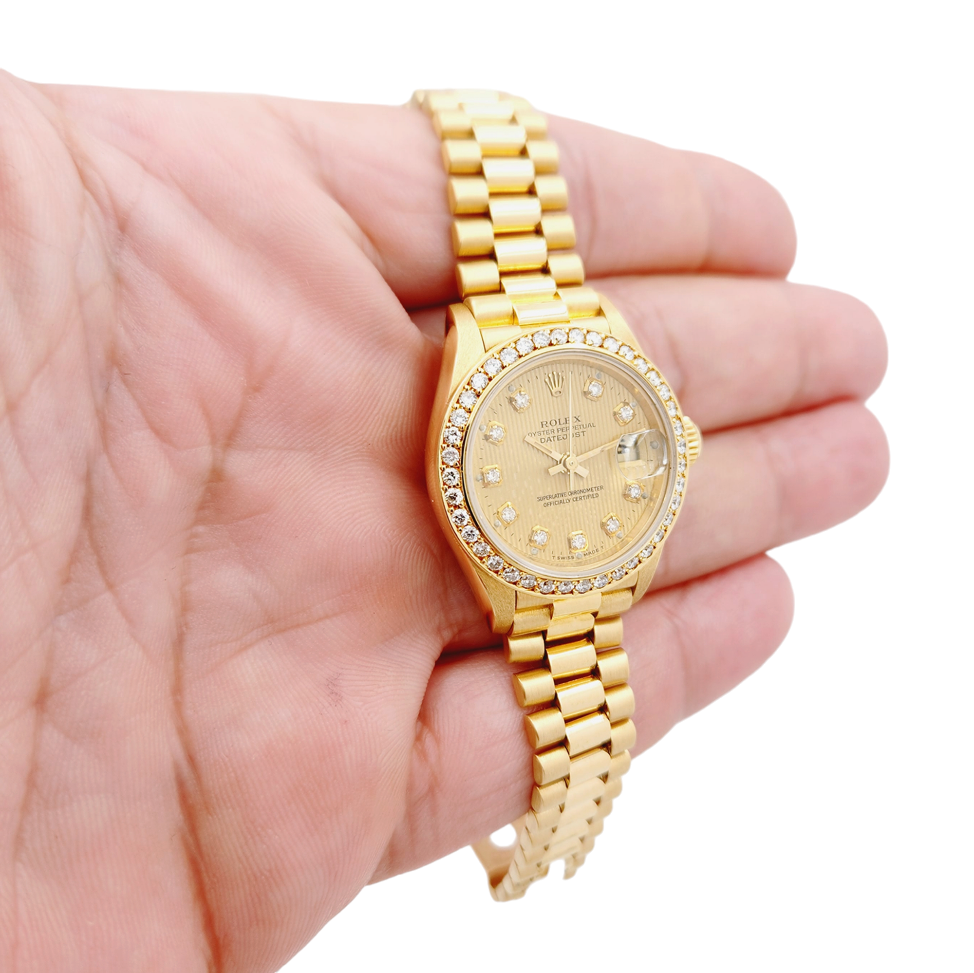 Ladies Rolex 26mm Presidential 18K Solid Yellow Gold Watch with Gold Tapestry Diamond Dial and Diamond Bezel. (Pre-Owned 69174)
