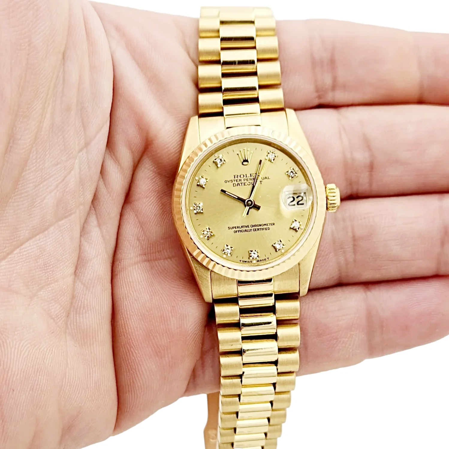 Ladies Rolex 31mm Midsize Presidential 18K Solid Yellow Gold Watch with Champagne Diamond Dial and Fluted Bezel. (Pre-Owned 68278)