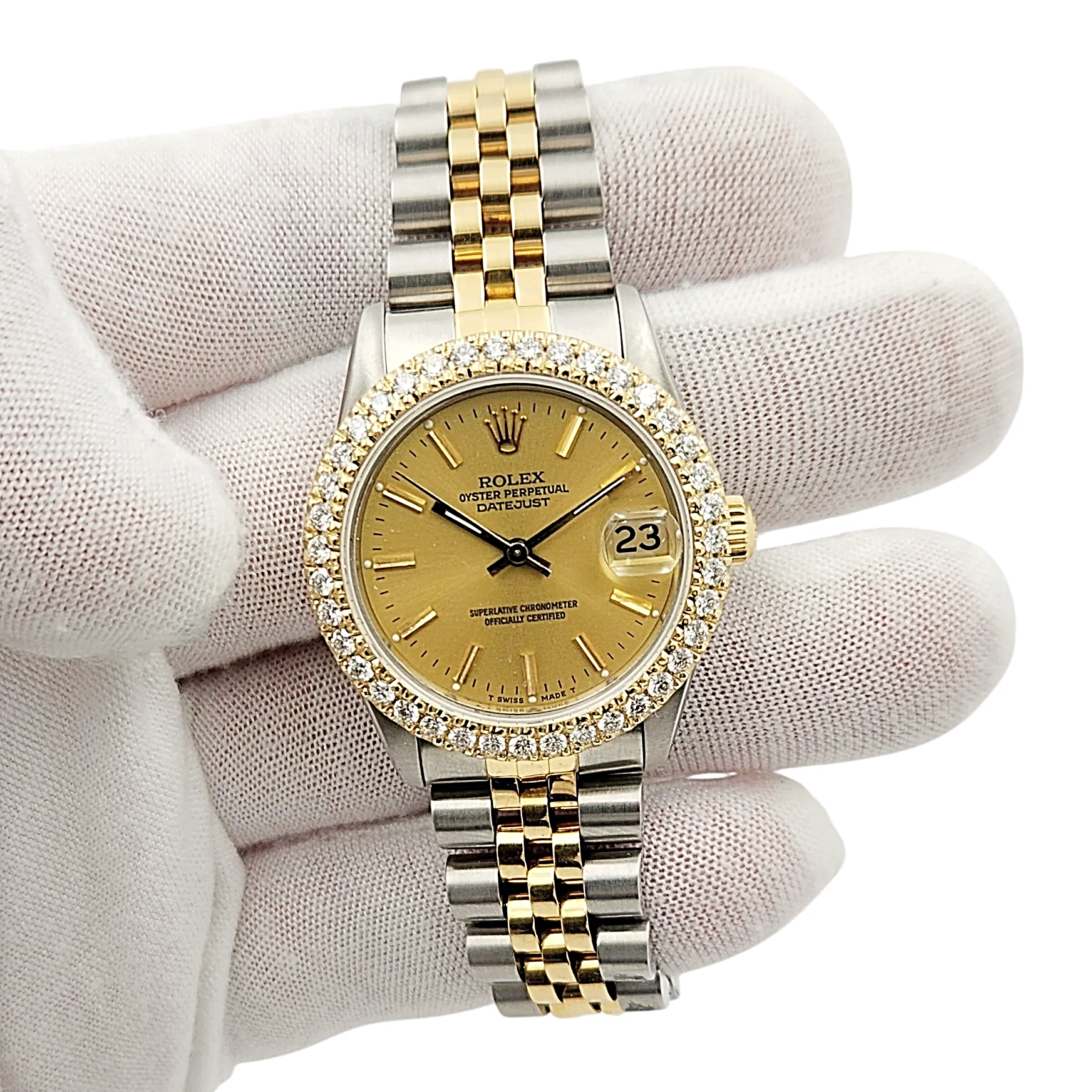 Ladies Rolex Midsize 31mm DateJust Two Tone 18K Yellow Gold / Stainless Steel Watch with Gold Dial and Diamond Bezel. (Pre-Owned 68273)