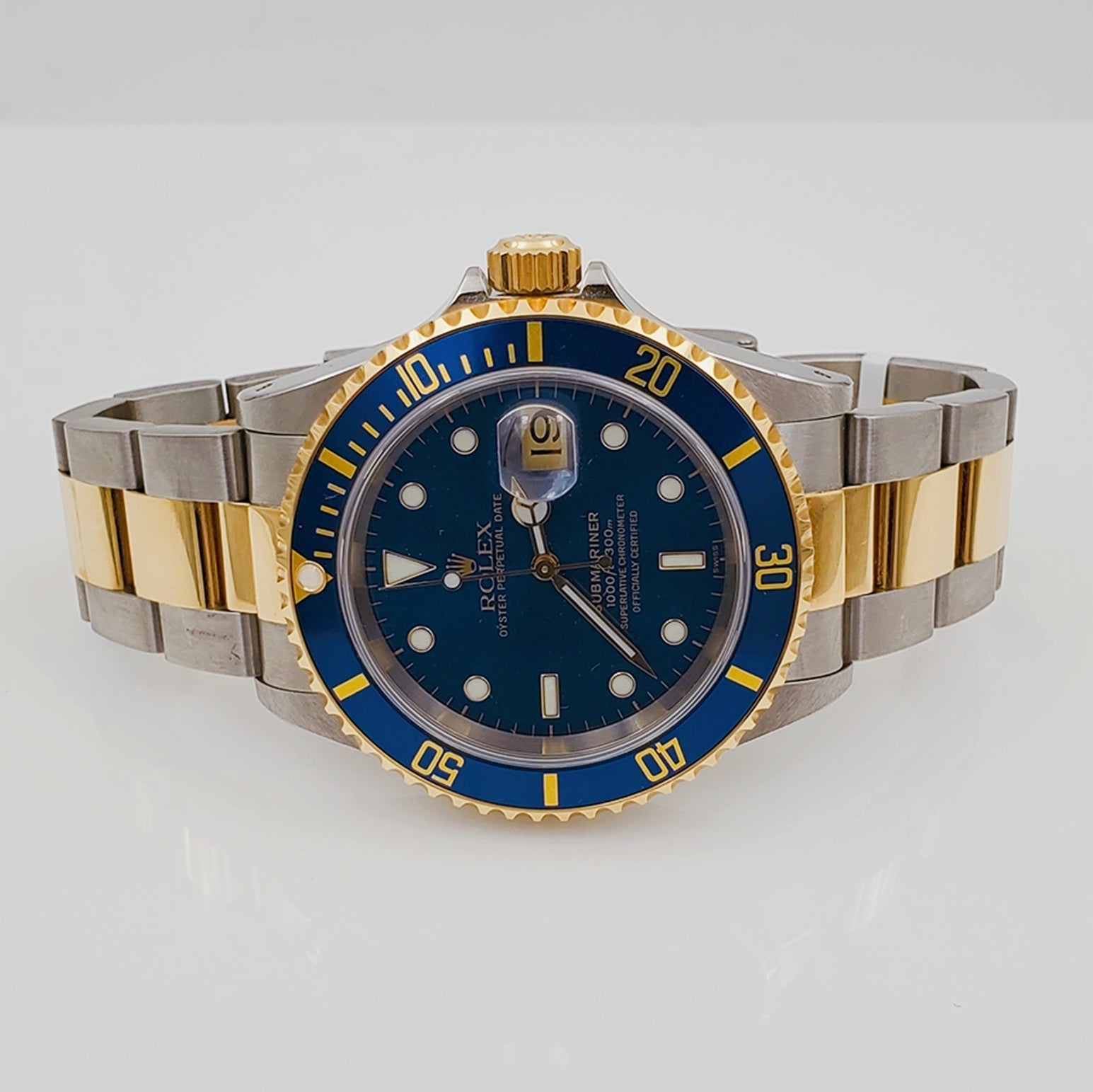 1999 Men's Rolex 40mm Submariner Oyster Perpetual Two Tone 18K Yellow Gold / Stainless Steel Wristwatch w/ Blue Dial & Blue Bezel. (UNWORN 16613)