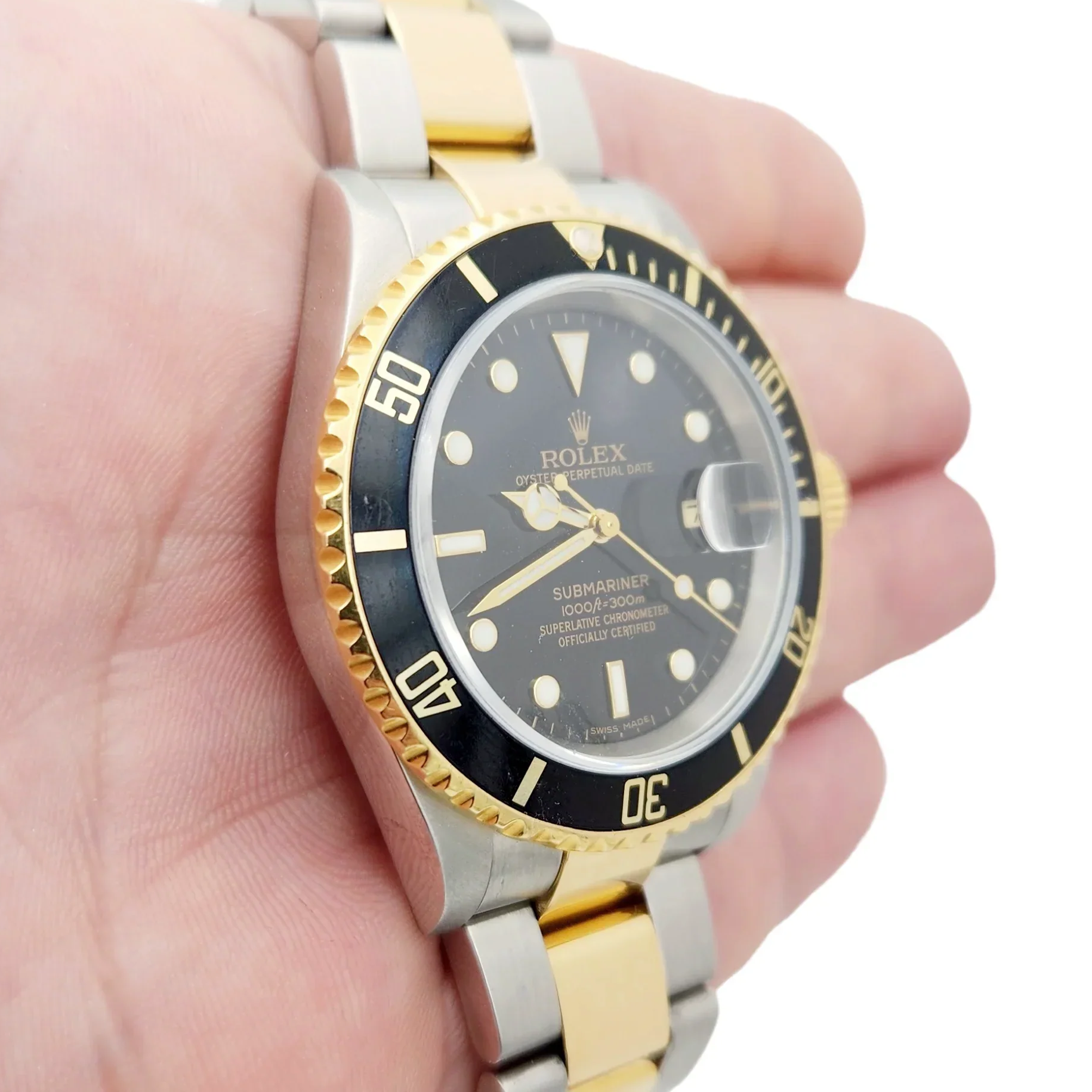 Men's Rolex 40mm Submariner Oyster Perpetual Two Tone 18K Yellow Gold / Stainless Steel Watch with Black Dial and Black Bezel. (Pre-Owned 16613)