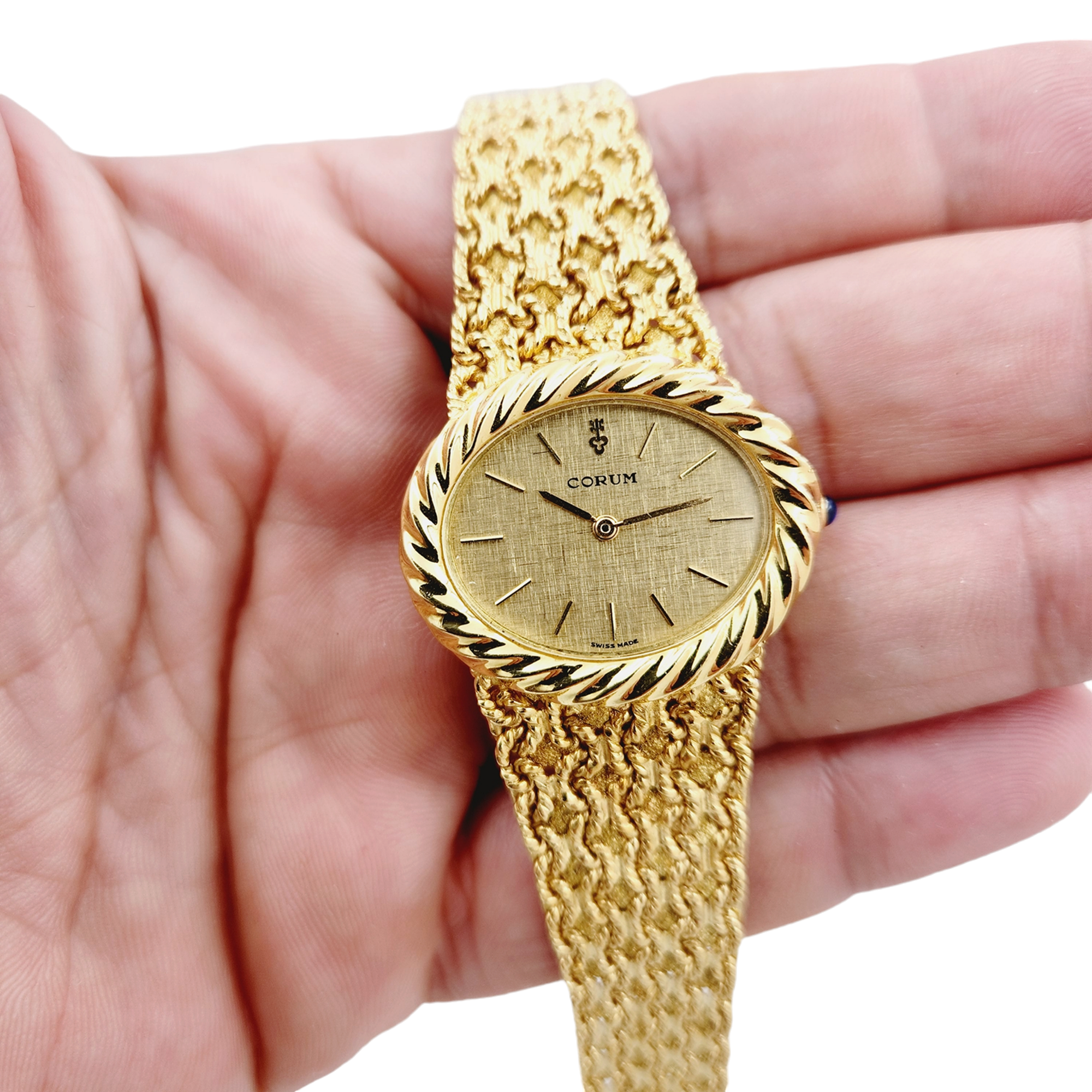 Ladies Corum 26mm x 30mm Oval Vintage 18K Yellow Gold Watch with Gold Dial and Weave Bezel. (Pre-Owned)