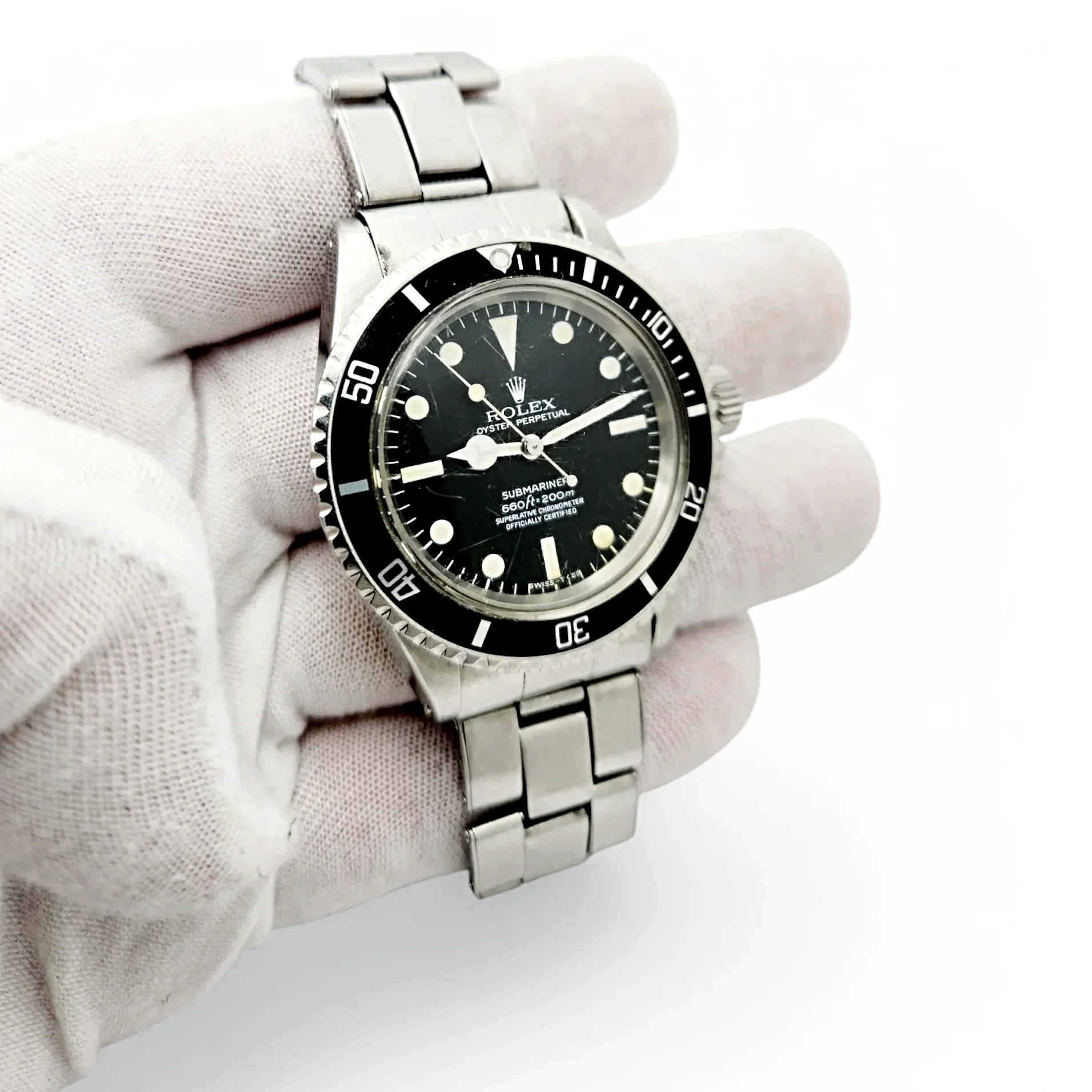 1970 Men's Rolex 40mm Vintage Submariner Stainless Steel Watch with Black Dial and Fluted Bezel. (Pre-Owned 5513)