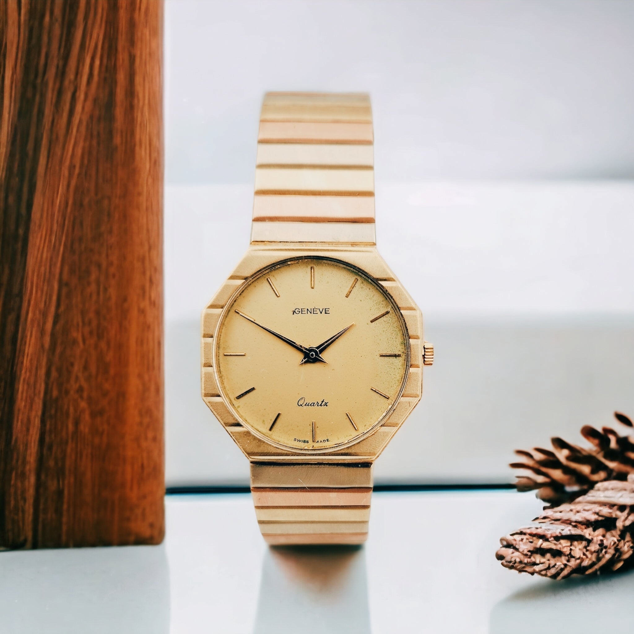 Unisex Geneve 32mm Vintage 14K Yellow Gold Watch with Gold Dial and Fluted Bezel. 