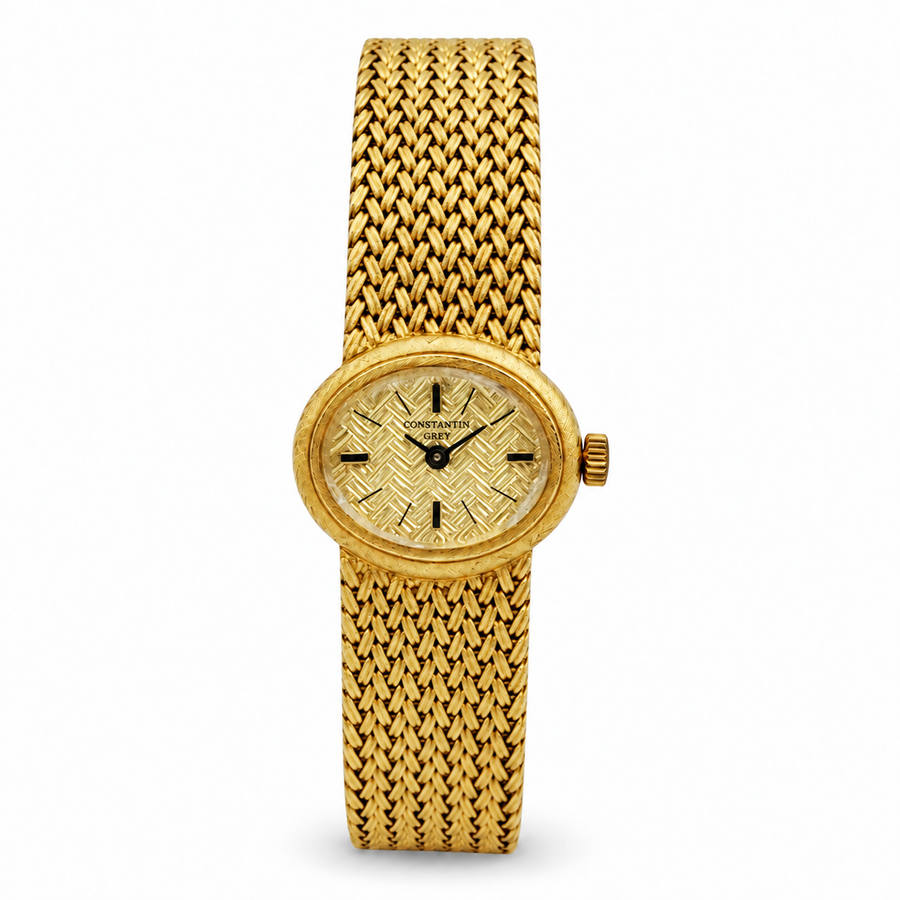 Ladies Constantin Grey 19mm x 22mm Vintage 14K Yellow Gold Watch with Gold Oval Dial and  Basketweave  Bezel. (Pre-Owned)