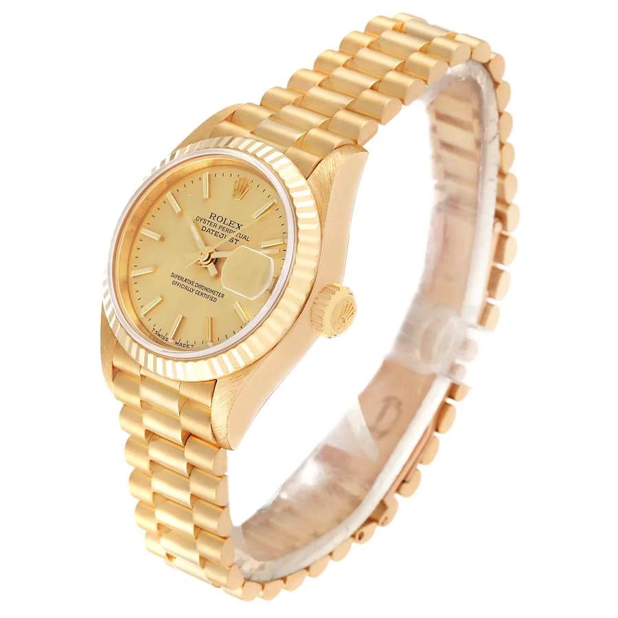 Ladies Rolex 26mm Presidential 18K Yellow Gold Watch with Gold Dial and Fluted Bezel. (Pre-Owned 6917)