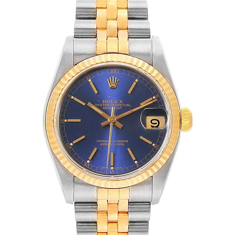 Ladies Rolex Midsize 31mm DateJust Two Tone 18K Yellow Gold / Stainless Steel Watch with Blue Dial and Fluted Bezel. (Pre-Owned 68273)