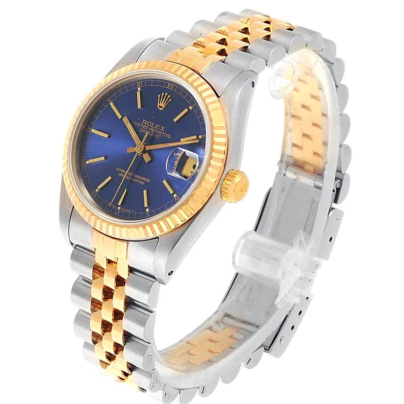 Ladies Rolex Midsize 31mm DateJust Two Tone 18K Yellow Gold / Stainless Steel Watch with Blue Dial and Fluted Bezel. (Pre-Owned 68273)