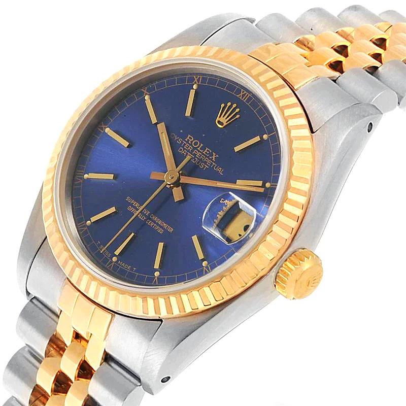 Ladies Rolex Midsize 31mm DateJust Two Tone 18K Yellow Gold / Stainless Steel Wristwatch w/ Blue Dial & Fluted Bezel. (Pre-Owned 68273)