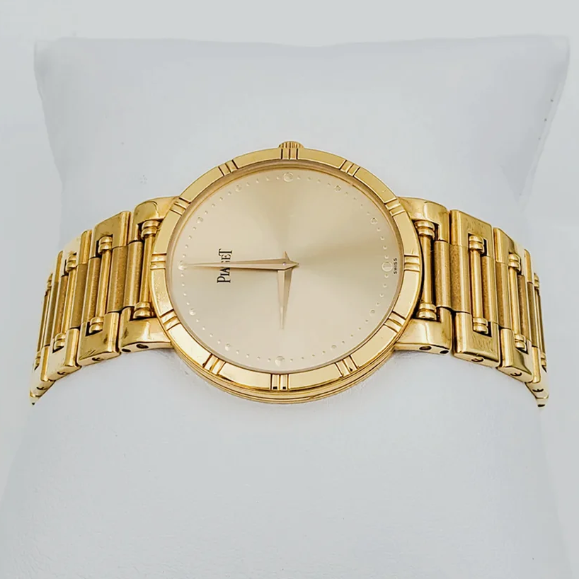 *Men's Piaget 31mm Dancer Vintage Solid 18K Yellow Gold Band Watch with Champagne Dial. (Pre-Owned)