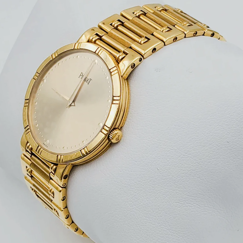 *Men's Piaget 31mm Dancer Vintage Solid 18K Yellow Gold Band Watch with Champagne Dial. (Pre-Owned)