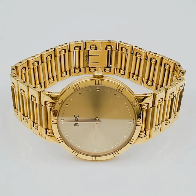 *Men's Piaget 31mm Dancer Vintage Solid 18K Yellow Gold Band Watch with Champagne Dial. (Pre-Owned)