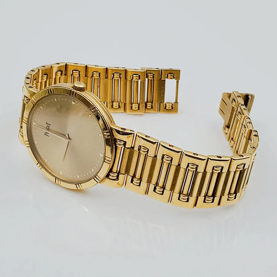 *Men's Piaget 31mm Dancer Vintage Solid 18K Yellow Gold Band Watch with Champagne Dial. (Pre-Owned)