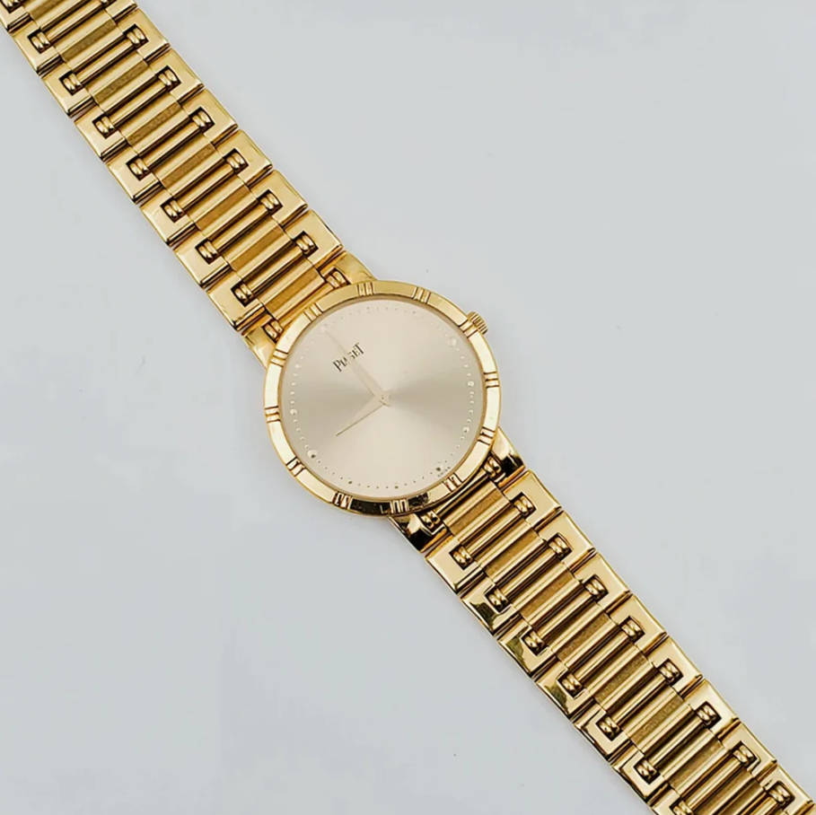 *Men's Piaget 31mm Dancer Vintage Solid 18K Yellow Gold Wristwatch with Champagne Dial. (Pre-Owned)